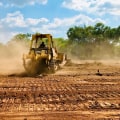 How Groundskeeping and Land Clearing Services Work Together in Columbia, MO